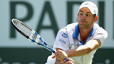 Andy Roddick returns to James Blake during his 6-3, 7-5 triumph at Indian Wells.