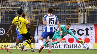Dortmund's Emre Can scores against Hertha. Getty