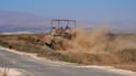 An Israeli tank drives along the ceasefire line between the Israeli-occupied Golan Heights and Syria. Reuters