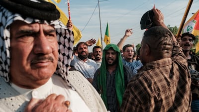 PMF Supporters in Baghdad celebrate the end of US military presence in Iraq. Getty Images