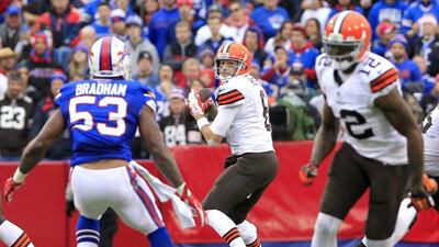 Cleveland Browns quarterback Brian Hoyer, centre, looks to pass during Cleveland's loss to Buffalo in the NFL on Sunday. Bill Wippert / AP / November 30, 2014