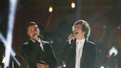 Liam Payne, left, and Harry Styles of One Direction perform ‘Story of My Life’ at the 41st American Music Awards in Los Angeles, California. Lucy Nicholson / Reuters