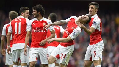 Arsenal kept alive their faint Premier League title hopes with a 4-0 win over Watford. Dylan Martinez / Reuters