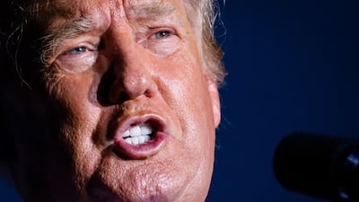 Mr Biden said 'Maga Republicans', supporters of his predecessor Donald Trump, pictured, want the US to be 'a nation of fear, division and of darkness'. AFP