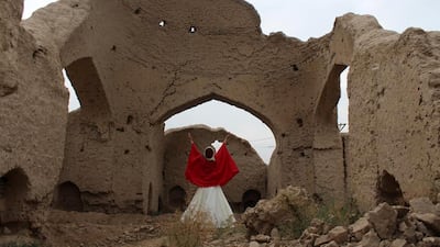 Fahima Mirzaie, 24, dances in the ruins believed to be Rumi's birthplace. Courtesy Fahima Mirzaie