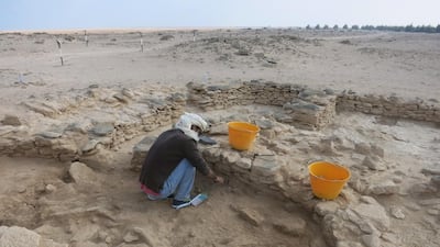 Abdulla Al Kaabi, a coastal heritage archaeologist at the Department of Culture and Tourism, on a previous dig on Marawah Island. Major excavations have been under way for the past few years. Courtesy Department of Culture and Tourism - Abu Dhabi