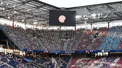 The eclipse is shown on a big screen at Stadion Salzburg in Austria, where Paris Saint-Germain were playing Aston Villa in the Uefa Super Cup. Reuters