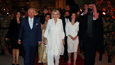 King Charles and the queen consort, who is dressed in white Anna Valentine piece, attend a centenary celebration of the founding of the Jordanian state, at the Jordan Museum in Amman on November 17, 2021. Reuters