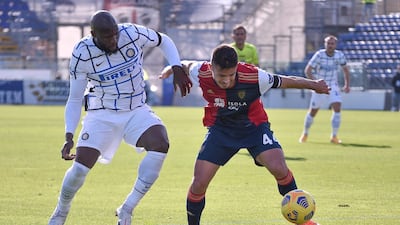 Cagliari's Andrea Carboni, right, and Inter's Romelo Lukaku vie for the ball at the Sardegna Arena on Sunday. AP