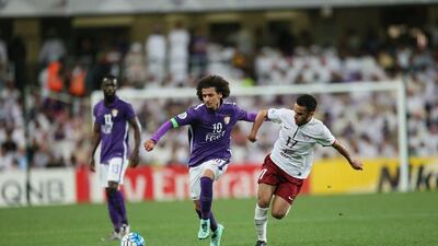 El Jaish, in white, met Al Ain and playmaker Omar Abdulrahman, centre, twice in the Asian Champions League group stages, winning 2-1 both home and away. Anas Kanni / Aletihad