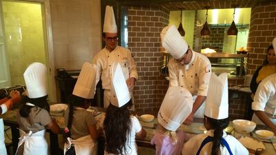 The kids’ cookery class at Villa Toscana, St. Regis Abu Dhabi on the Corniche, Abu Dhabi. Photo by Stacie Johnson