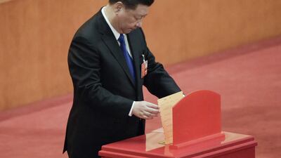 China's parliament unanimously reelected Xi Jinping for a second presidential term on March 17, and voted Wang Qishan as his deputy, giving him a strong ally to consolidate power and handle US trade threats. AFP