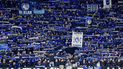 Atalanta fans during a match at the San Siro stadium in Milan. AFP