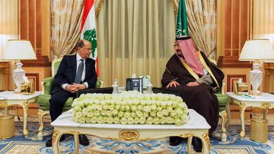 Lebanese president Michel Aoun, left, discusses relations with King Salman in Riyadh, Saudi Arabia. Saudi Press Agency via AP