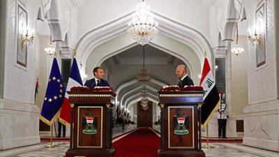 Iraqi President Barhim Saleh and his French counterpart Emmanuel Macron hold a joint press conference at Baghdad's al-Salam Palace. AFP