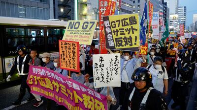 Anti-G7 protesters march through Hiroshima, Japan, where a G7 meeting was to be held. Reuters