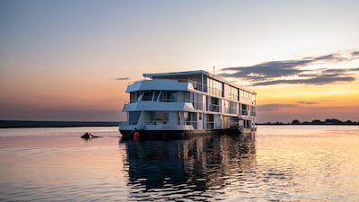 The Zambezi Queen riverboat offers a regal safari that flits between the shores of Botswana and Namibia. Photo: Andrew Morgan