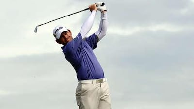 South African golfer Louis Oosthuizen plays a tee shot during his second round at St Andrews in Scotland.