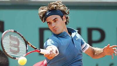 Roger Federer took his time but was rarely troubled in his third round match with Julian Reister.