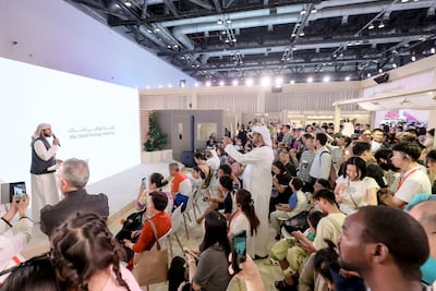 Al Mansoori performs Al Shella for visitors at the UAE pavilion. Photo: Abu Dhabi Heritage Authority