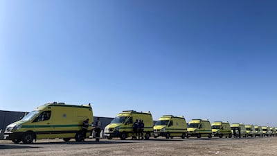 Ambulances wait at the Rafah border crossing between Egypt and Gaza. Getty Images