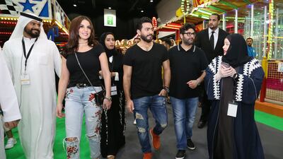 Tamer Hosny pays a visit to Modhesh World at the Dubai World Trade Centre.