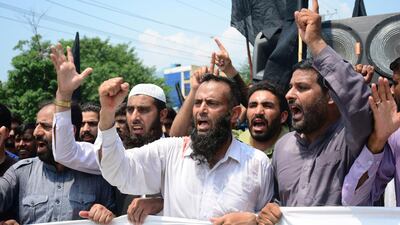 Kashmiris protest against India in Muzaffarabad. AP