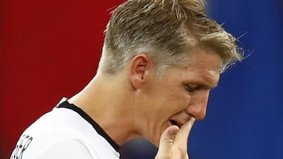 Germany's Bastian Schweinsteiger reacts after the game. (REUTERS/Kai Pfaffenbach)