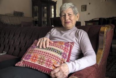 Samia Khoury, a Palestinian Christian, sits in the living room of her home in the east Jerusalem neighbourhoud of Beit Hanina, recalling how she helped save Palestinian refugees that had fled from their homes in 1948. (Photo by Heidi Levine/For The National).