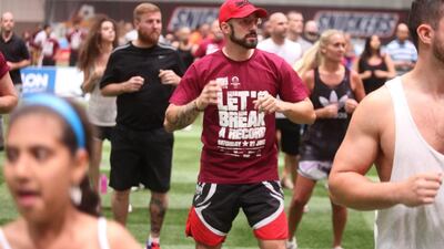Two time boxing champion David Haye attempted to break the Guinness book of world records by having more than 500 people participate in a boxing practice inside of the World Trade Center’s Sports Zone. Members of the crowd had to at least bounce if too tired to jab, punch, and so on, for the duration of the session. Lee Hoagland / The National