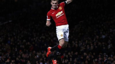 Manchester United's James Wilson celebrates after scoring against Cambridge United. Phil Noble / Reuters