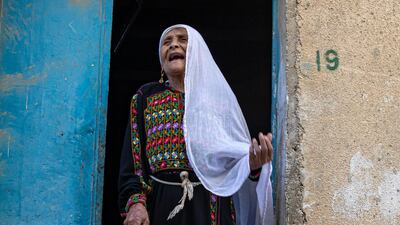 About ninety years old Palestinian refugee Halima Abdehadi Mhamed, gestures as she speaks to the journalist at her house door, in the Baqa'a Palestinian refugee urban camp, near Amman, Jordan. She is originally from Dhekrein near Hebron in what used to be Palestine, she left her village with her family to flee violence first in 1948 then moved again three times more, always further towards Jordan, until they reached the Baqa'a Palestinian refugee urban camp after the 1967 flair of violence. She worked as a farmer and has no direct family. The World Refugee Day is marked on 20 June. World Refugee Day is marked annually on 20 June. According to the UNHCR, more and more refugees today live in urban settings outside refugee camps. EPA