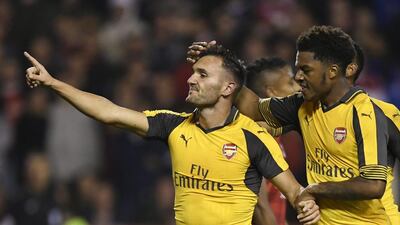 Africa’s richest man is a fan of Arsenal, above. He says he wants to buy the club and turn it around – once his business prospects improve. Tony O’Brien / Reuters