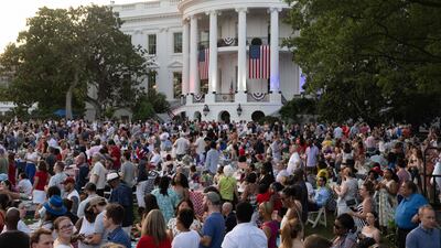 Guests attend a Fourth of July celebration on the South Lawn of the White House. AFP