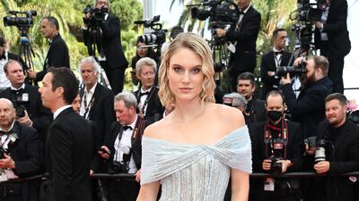 Kim Hnizdo attends the screening of 'The Innocent' during the 75th Cannes Film Festival, wearing a pale blue, fully beaded, couture spring-summer 2002 dress by Rami Al Ali. Getty Images