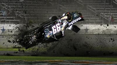 Timothy Peters flips coming down the front stretch during the Nascar Trucks auto race at Texas Motor Speedway. Larry Papke / AP Photo