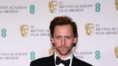 Actor Tom Hiddleston arrives at the 2021 Bafta Awards at the Royal Albert Hall, London, England on April 11, 2021. AP Photo