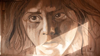 'I began to draw portraits and faces that reflect the destruction that we live and the dream we aspire to achieve.,' al-Jabali says of his work. Courtesy Fady Hanona