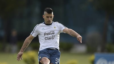 Argentina’s forward Sergio Aguero strikes the ball during a training session in Ezeiza, Buenos Aires on March 21, 2016 ahead of a 2018 FIFA World Cup Russia South American qualifier football match against Chile to be held in Santiago on March 24. AFP PHOTO / JUAN MABROMATA