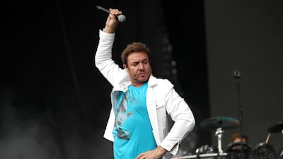 Simon Le Bon of Duran Duran performs during day four of the Singapore Formula One Grand Prix September 17. Getty Images