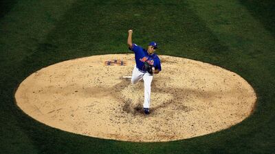 Jeurys Familia #27 of the New York Mets throws a pitch against the Kansas City Royals during Game Five of the 2015 World Series at Citi Field on November 1, 2015 in the Flushing neighborhood of the Queens borough of New York City. Tim Bradbury/Getty Images/AFP