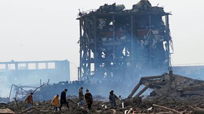 Relatives look for a missing worker at the pesticide plant owned by Tianjiayi Chemical following an explosion, in Xiangshui county, Yancheng, Jiangsu province. Reuters