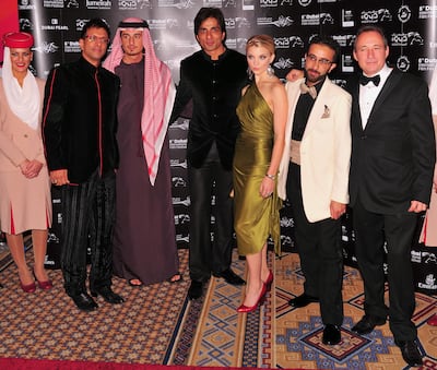 Emirati director Ali F Mostafa, third from left, with the cast of City of Life in 2009. Getty Images