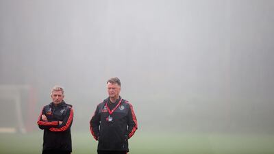 Louis van Gaal the manager of Manchester United looks on in the fog during a Manchester United training session on the eve of the UEFA Champions League Group B match against CSKA Moscow at Aon Training Complex on November 2, 2015 in Manchester, England. (Photo by Alex Livesey/Getty Images)