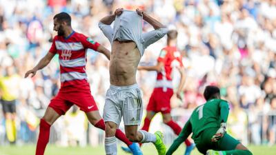 Real Madrid's Dani Carvajal covers his face after missing a chance. AP