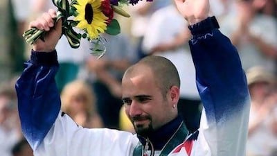 America's Andre Agassi says winning the gold medal at Atlanta in 1996 is the highlight of his career.