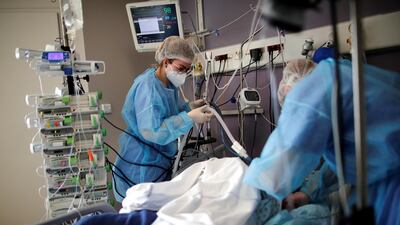Medical staff work in the Intensive Care Unit where patients suffering from coronavirus are treated at the Melun-Senart hospital, near Paris. Reuters