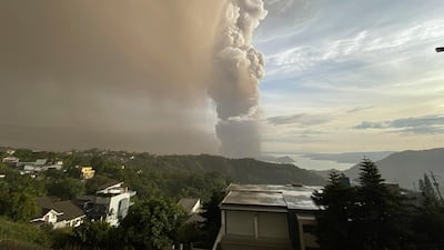 Plumes of smoke and ash rise from as Taal Volcano. AP