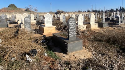 Lorries carrying bodies arrived daily at the Tell Al Nasser cemetery off the motorway between Homs and Hama. Lizzie Porter / the National