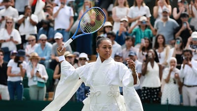 Naomi Osaka appears on court at Wimbledon on June 29, 2026, wearing a white kimono-style dress. AFP